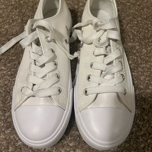 Size seven white leather shoes